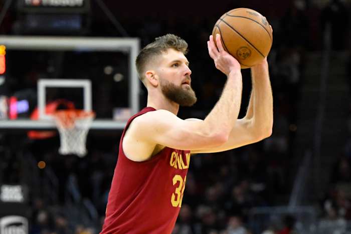 Nov 19, 2023; Cleveland, Ohio, USA; Cleveland Cavaliers forward Dean Wade (32) shoots in the fourth quarter against the Denver Nuggets at Rocket Mortgage FieldHouse.